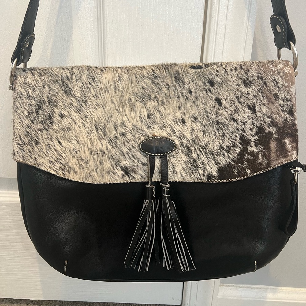 Leather messenger bag with tassels